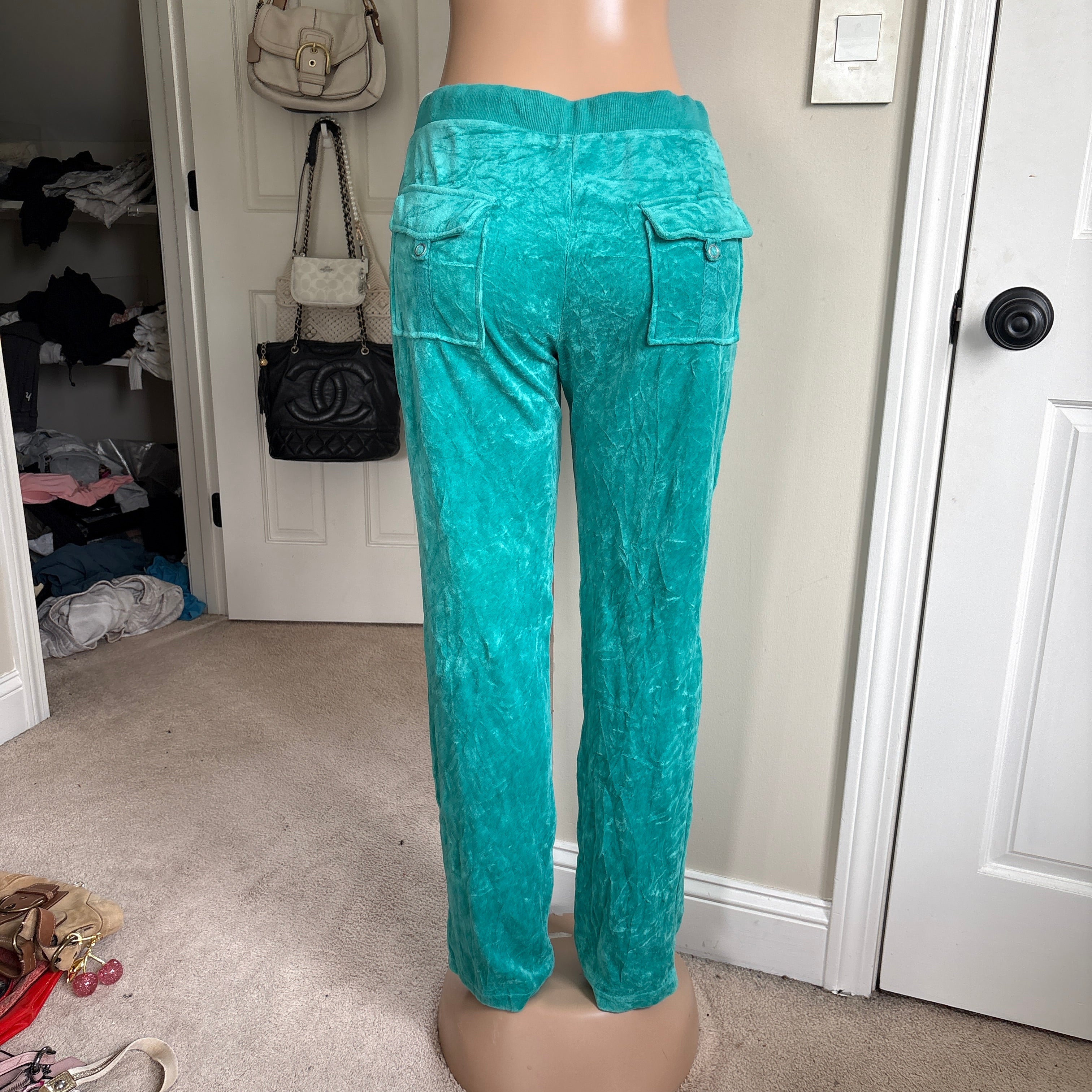 00s vintage Juicy Couture turquoise snapback sweatpants (size M/L)