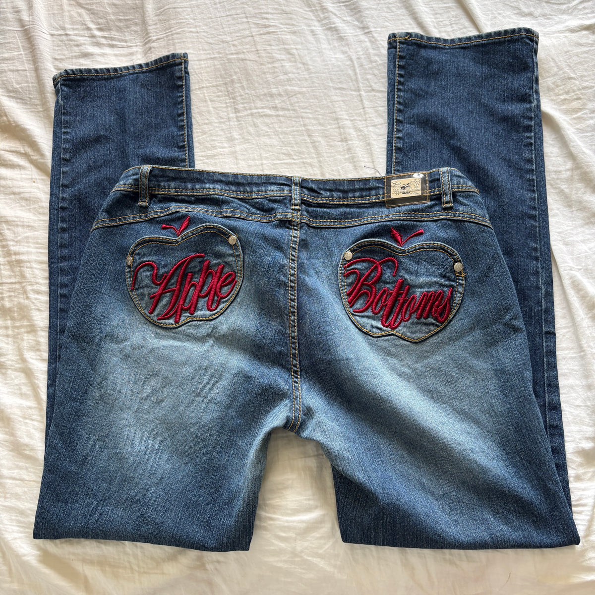 00s Apple Bottoms red spellout jeans (size L/XL)