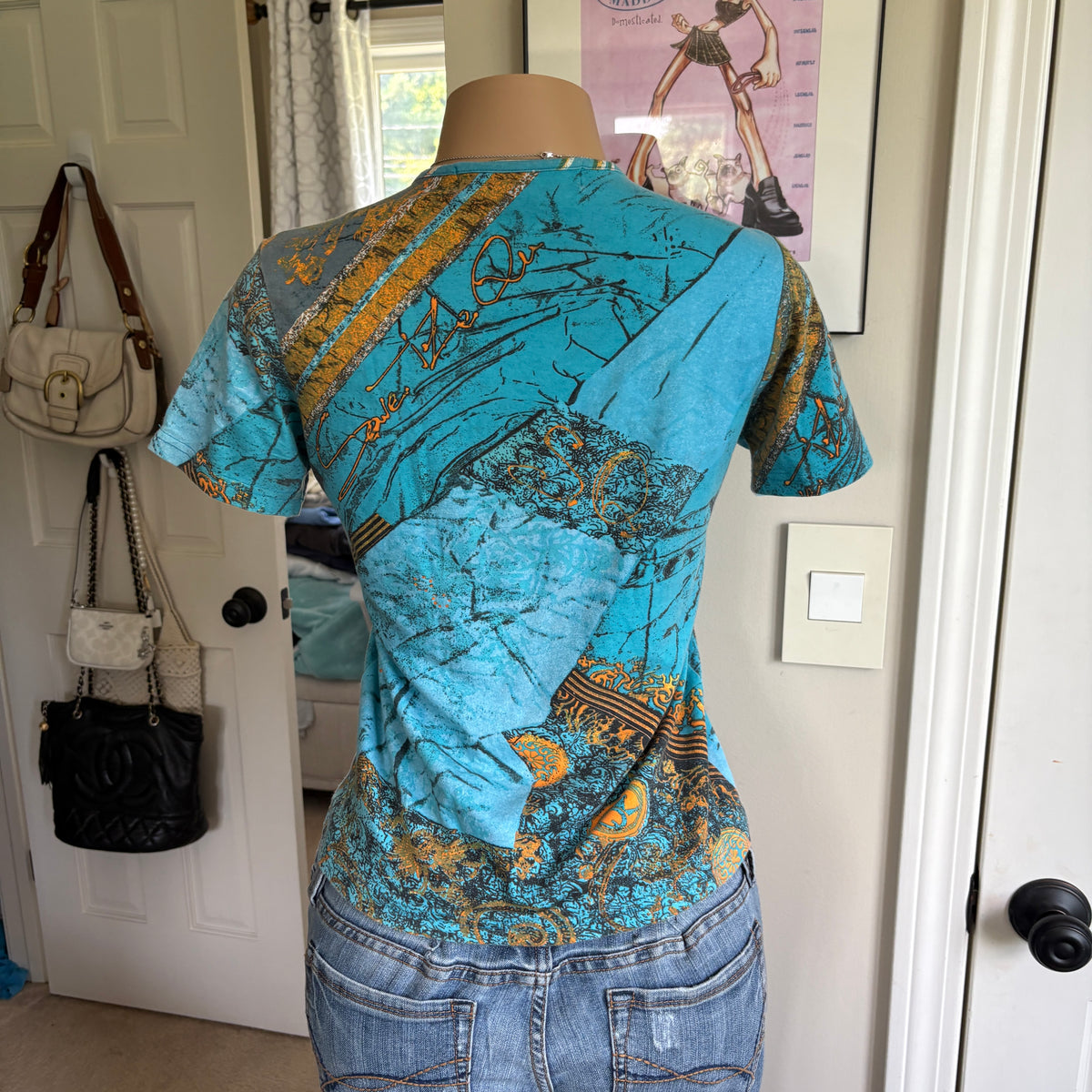 00s Miss Sixty blue aztec short sleeve top (size L)