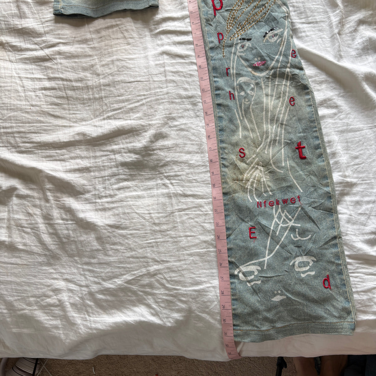 00s avant garde abstract face jeans (size S)