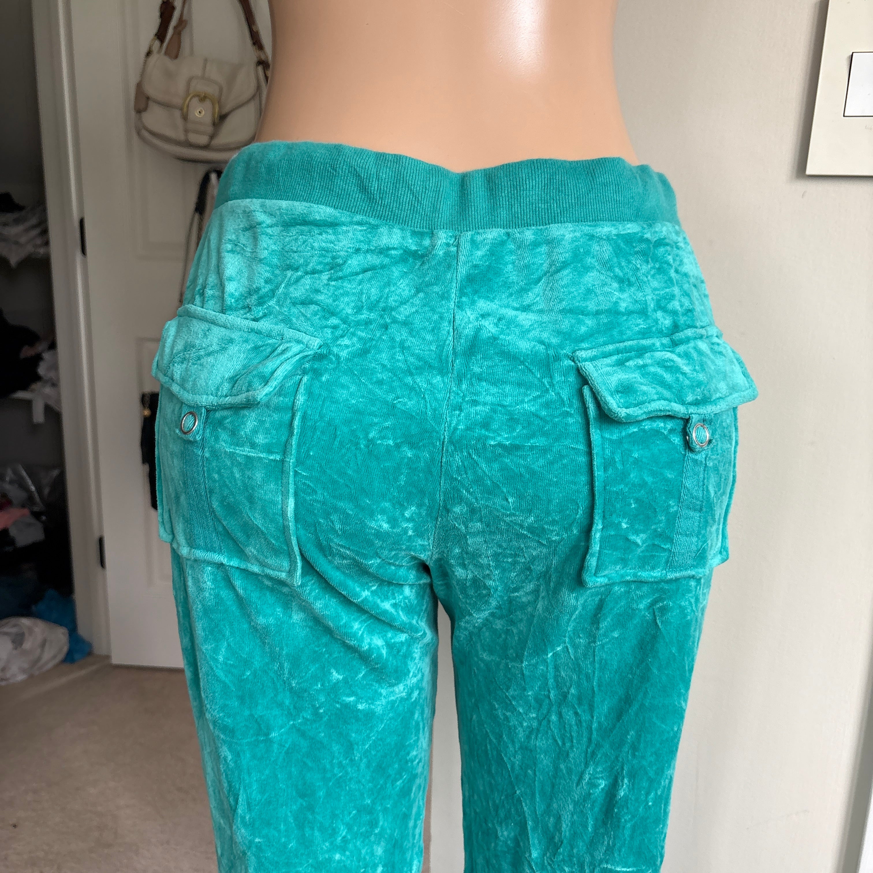 00s vintage Juicy Couture turquoise snapback sweatpants (size M/L)