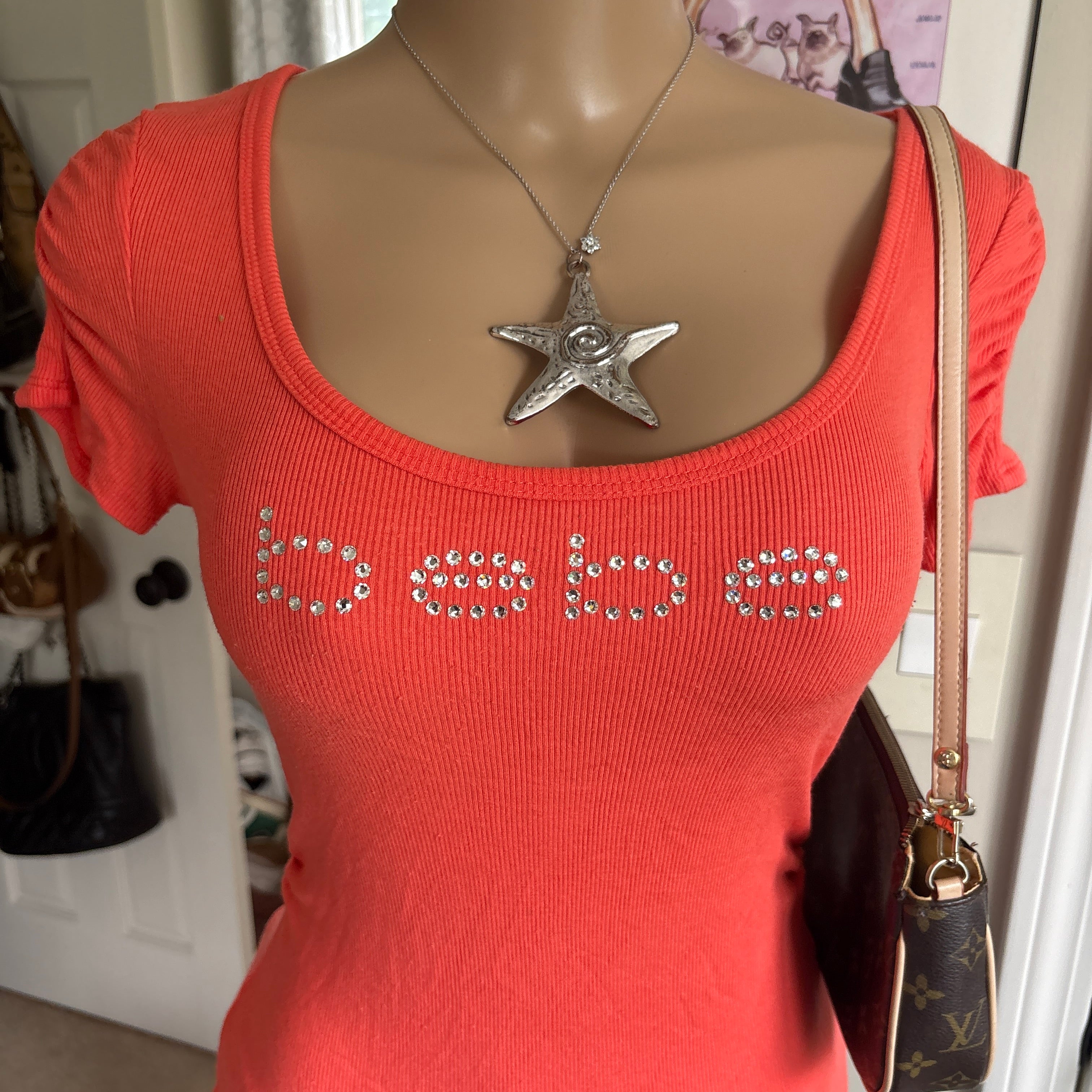00s Bebe coral bling spellout top (size M)
