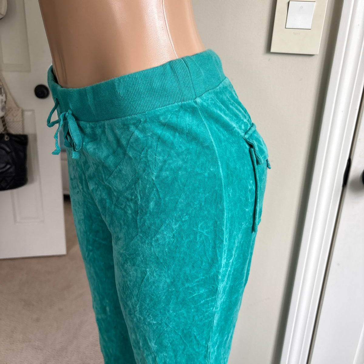 00s vintage Juicy Couture turquoise snapback sweatpants (size M/L)