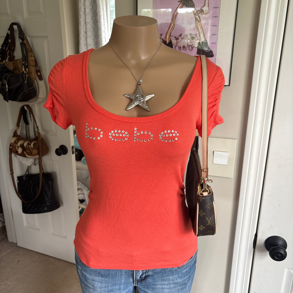 00s Bebe coral bling spellout top (size M)