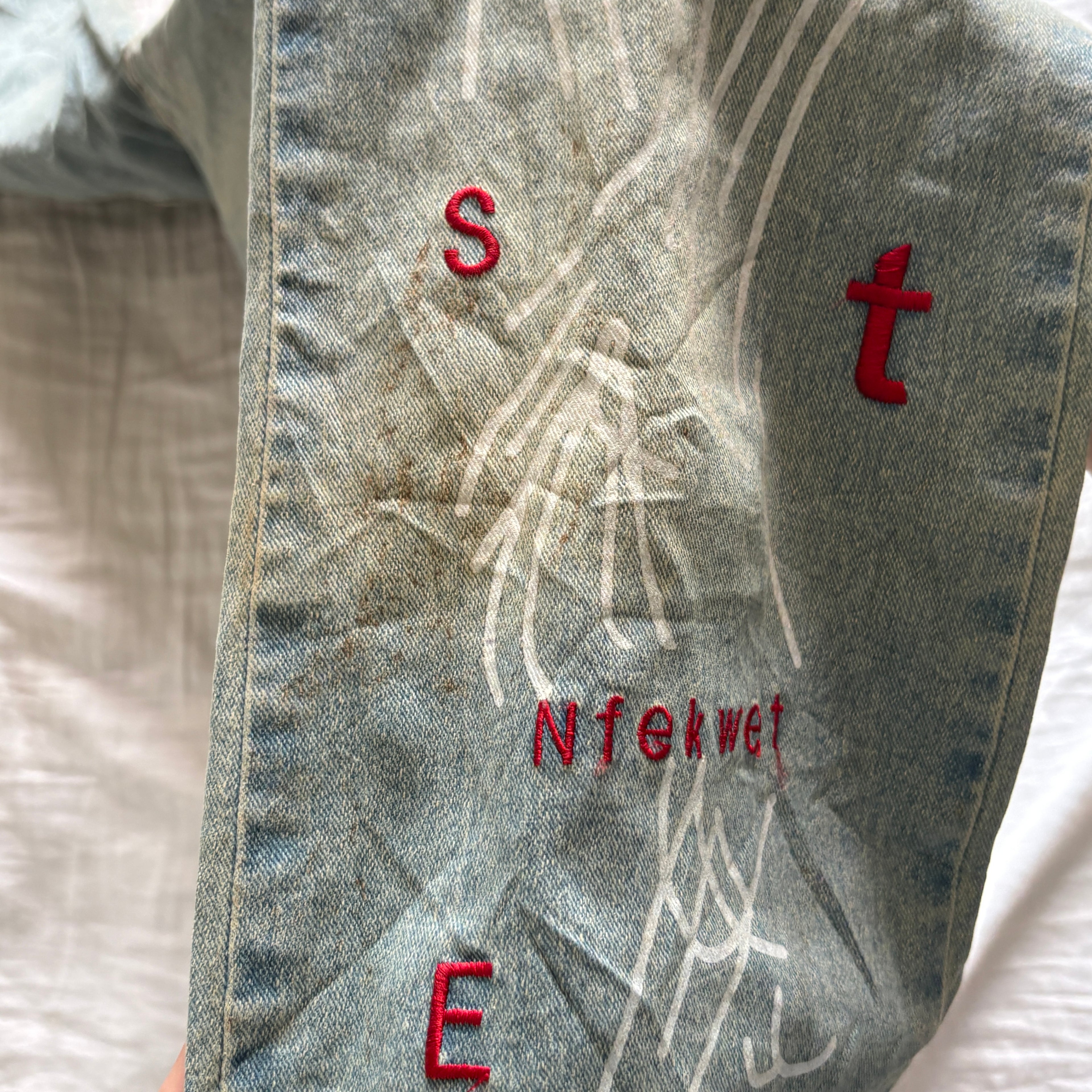 00s avant garde abstract face jeans (size S)