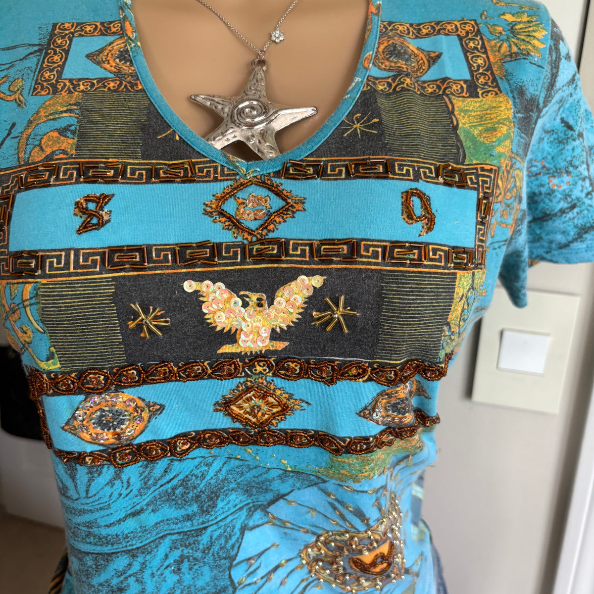 00s Miss Sixty blue aztec short sleeve top (size L)