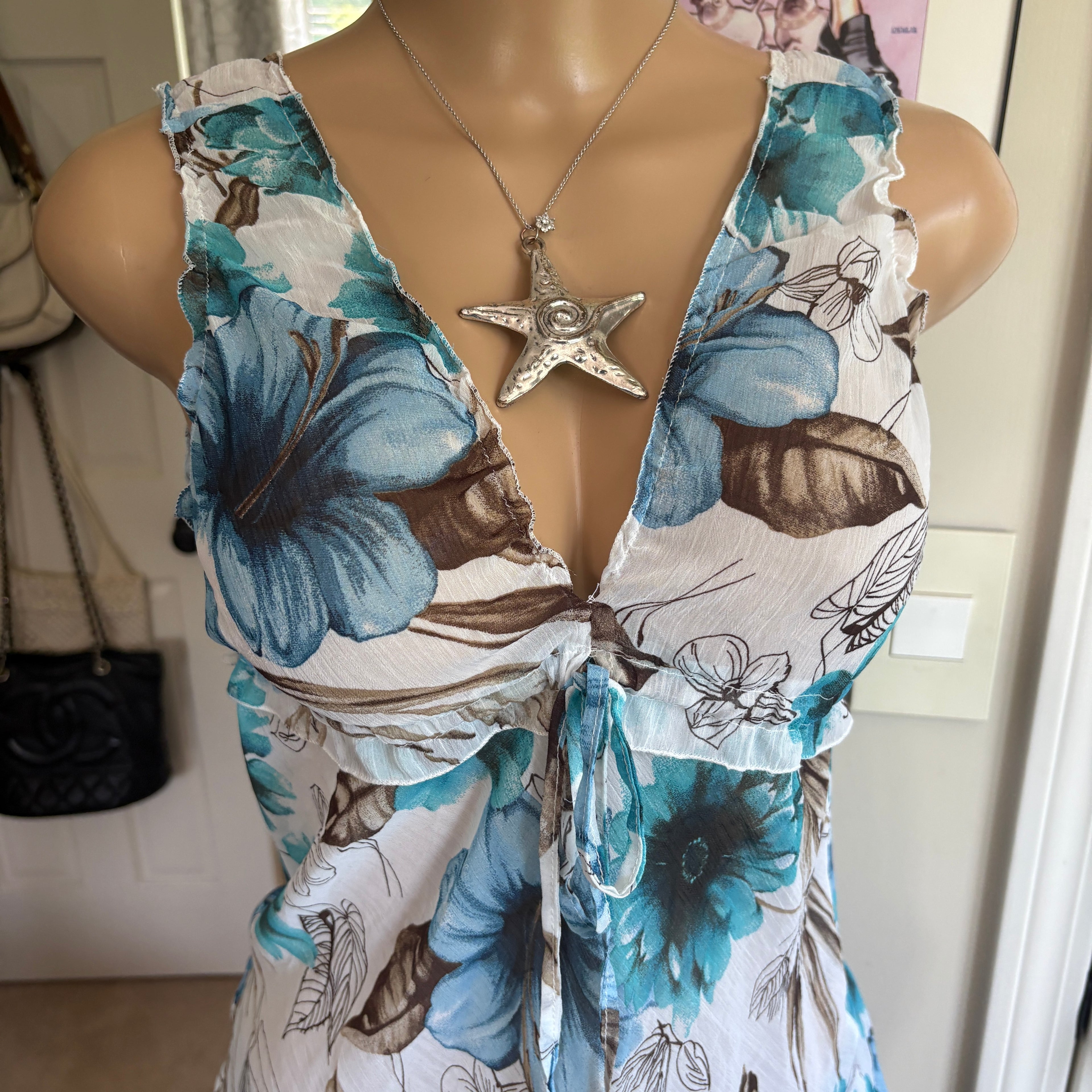 00s blue floral bow tank top (size L)