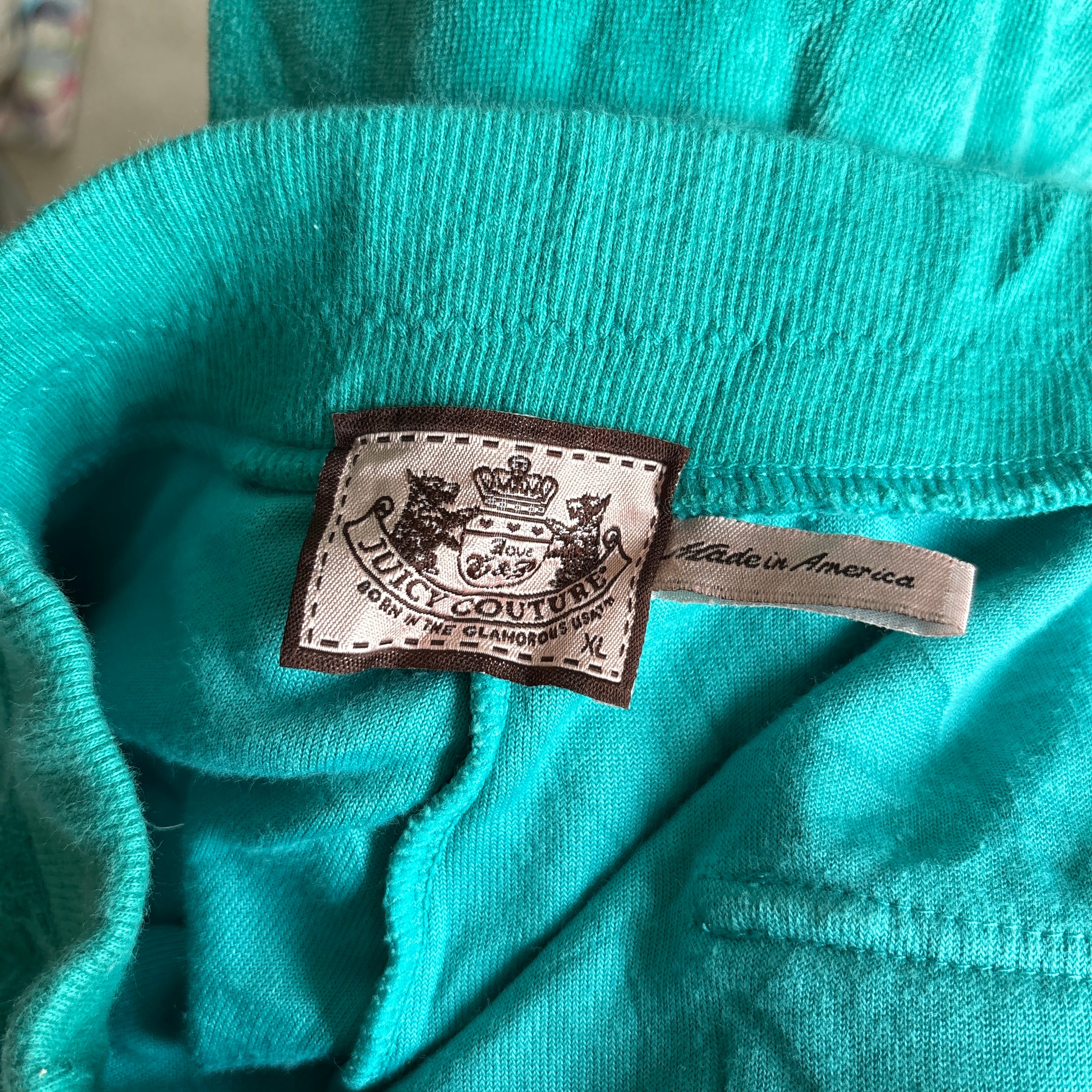 00s vintage Juicy Couture turquoise snapback sweatpants (size M/L)