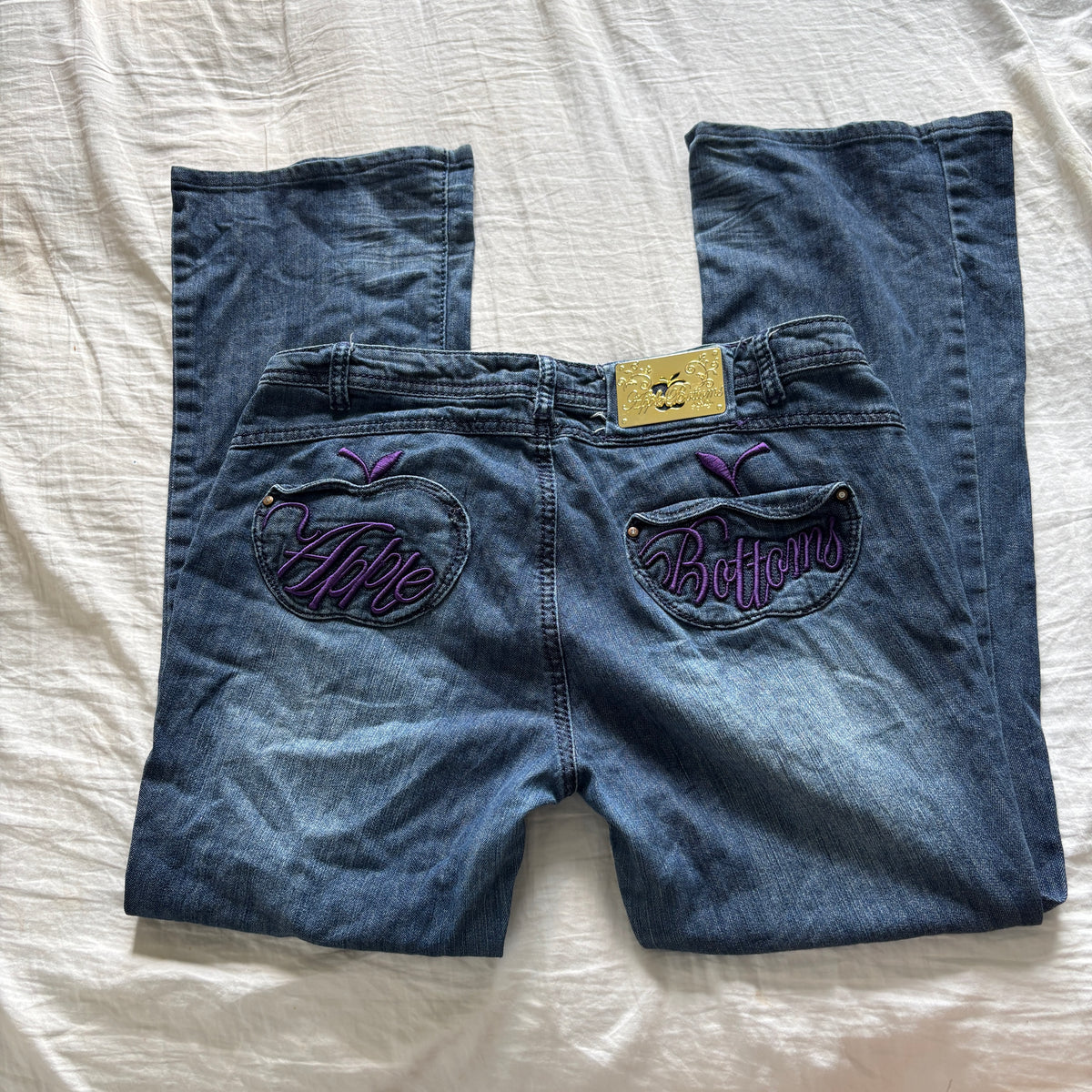 00s Apple Bottoms purple spellout jeans (size L)